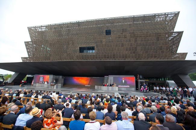 The Latest: Obamas officially open black history museum | iNFOnews.ca