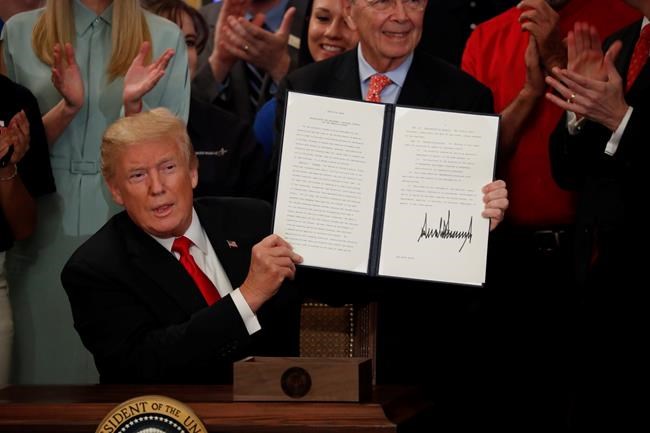 The Latest: Trump: US needs 'people with training' for jobs | iNFOnews.ca CP828122379