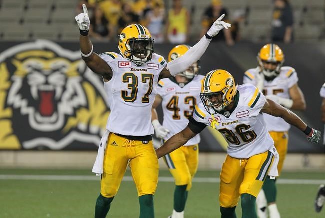 Mike Reilly throws three TDs, Eskimos beat Tiger-Cats 31-28 | iNFOnews.ca