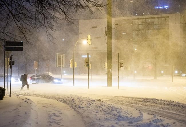 Heavy snowstorm pounds Germany, upends travel | iNFOnews.ca Heavy snowstorm pounds Germany, upends travel | iNFOnews.ca