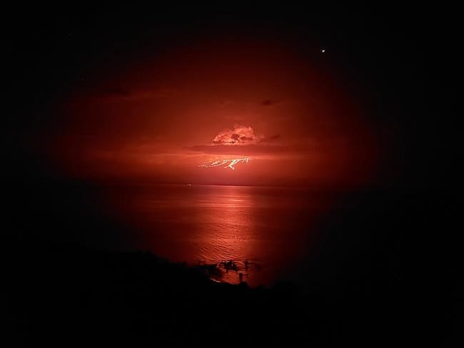 Volcano spews lava on Galapagos island | iNFOnews.ca