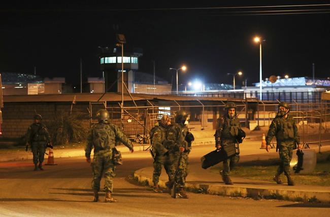 Weapons, cellphones seized after deadly Ecuador prison riots | iNFOnews.ca
