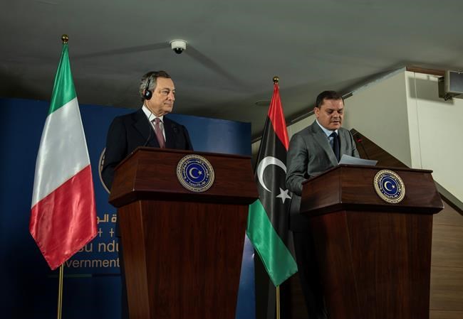 In his first travel abroad, new Italian PM visits Libya | iNFOnews.ca