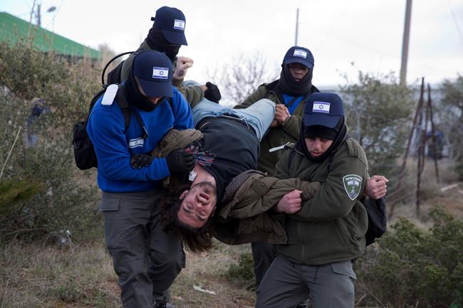 Israel evacuates West Bank outpost amid new settlement binge | iNFOnews.ca Israel evacuates West Bank outpost amid new settlement binge | iNFOnews.ca