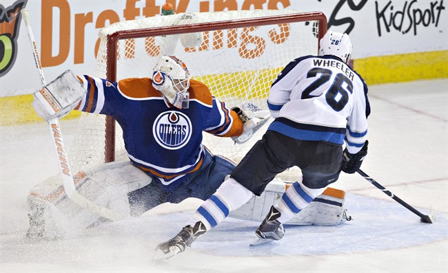 Pavelec makes 21 saves in return, Ladd scores in shootout as Jets edge Oilers | iNFOnews.ca CP36379890