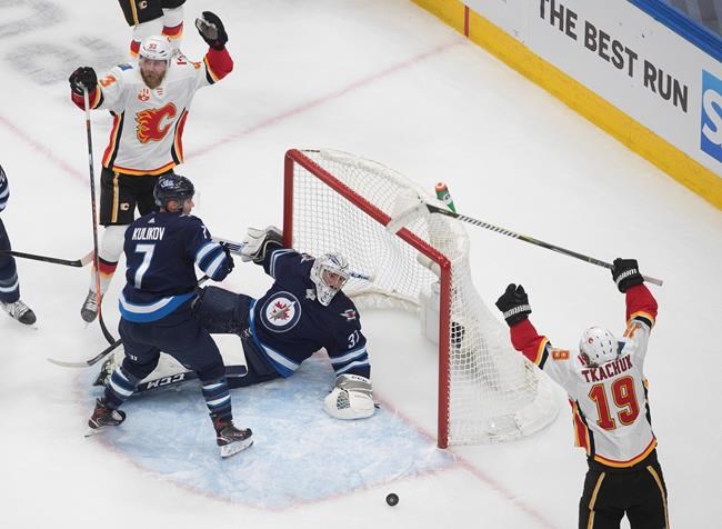 Flames defeat Jets 4-0 to win NHL qualifying series three games to one | iNFOnews.ca CP521649114