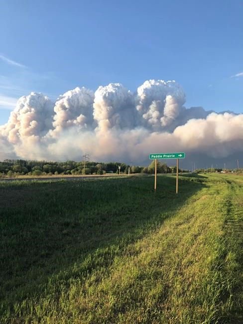 'Praying to God:' Man sings gospel as he watches his home burn in Alberta fire | iNFOnews.ca