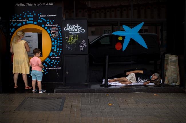 2 Spanish banks merge amid tough times for financial sector | iNFOnews.ca CP1618688979