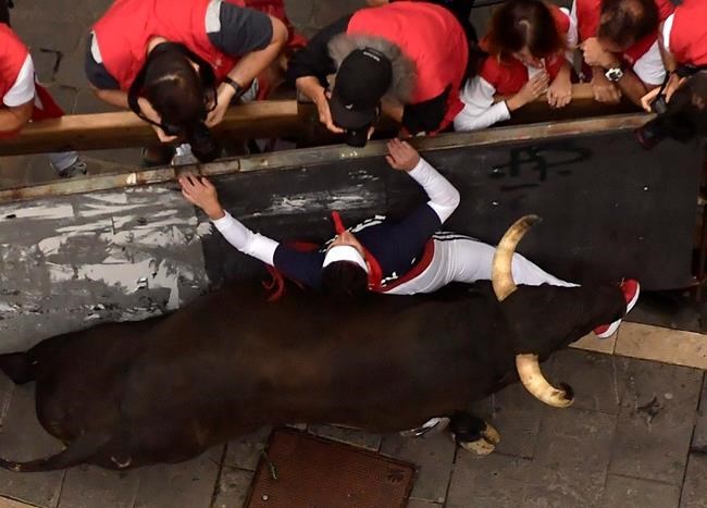 1 gored, 3 bruised while running with bulls in Pamplona | iNFOnews.ca
