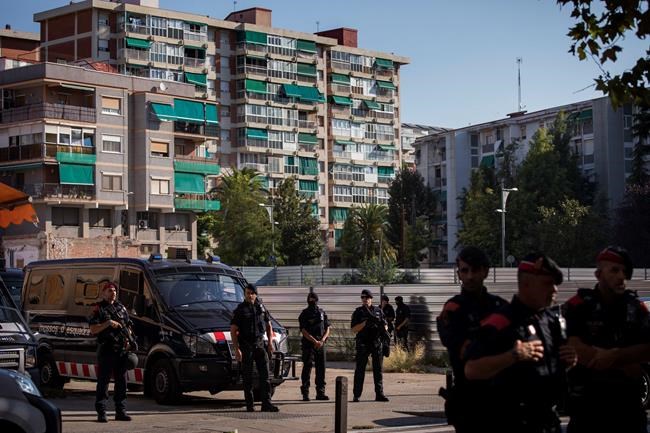 The Latest: Security increased at police stations in Spain | iNFOnews.ca
