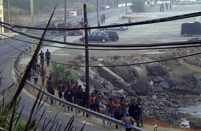 Over 150 migrants in Morocco climb fences to Spanish enclave | iNFOnews.ca Over 150 migrants in Morocco climb fences to Spanish enclave | iNFOnews.ca