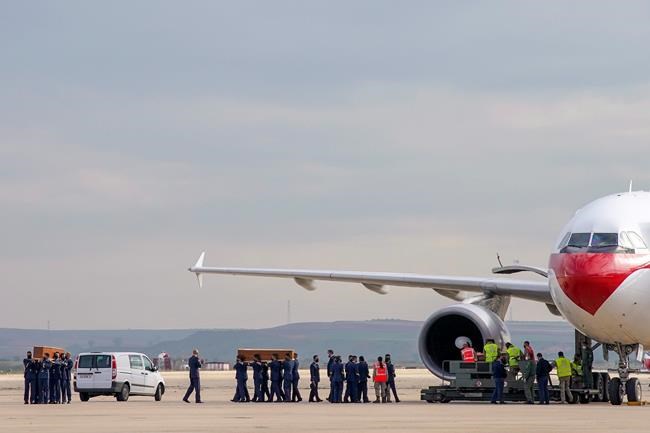 3 slain while filming poaching in Burkina Faso flown home | iNFOnews.ca CP1097089041