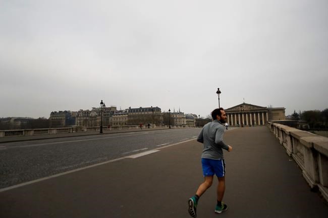 Confined by virus, Frenchman runs marathon on his balcony | iNFOnews.ca