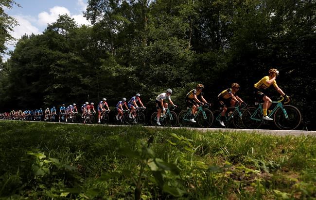 Working class pride and bubbly on the Tour de France route | iNFOnews.ca CP447189124