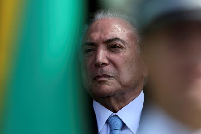 The Latest: Brazilian lawmakers block trial for president | iNFOnews.ca