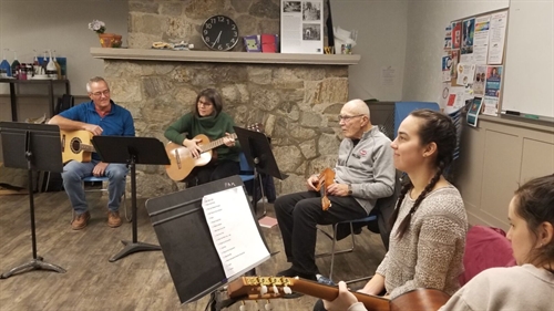 Strumming with Yanti at the Leir House