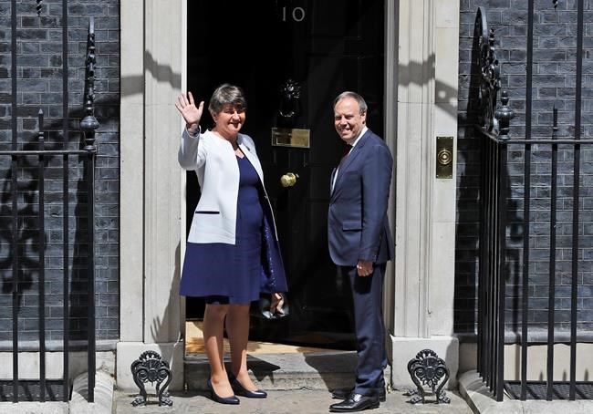 The Latest: UK's May cracks joke about election disaster | iNFOnews.ca