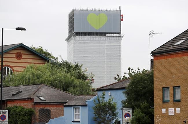 Banners wrapped on skeleton of London's Grenfell Tower | iNFOnews.ca CP2120269382