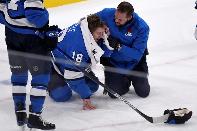 Jets centre Little hospitalized after being struck near the ear by a puck | iNFOnews.ca