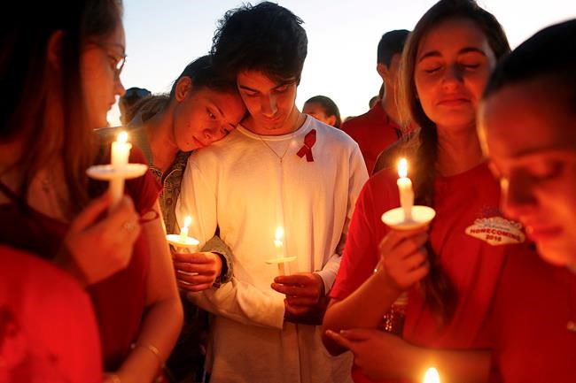 The Latest: Hundreds at vigil mourn school shooting victims | iNFOnews.ca The Latest: Hundreds at vigil mourn school shooting victims | iNFOnews.ca