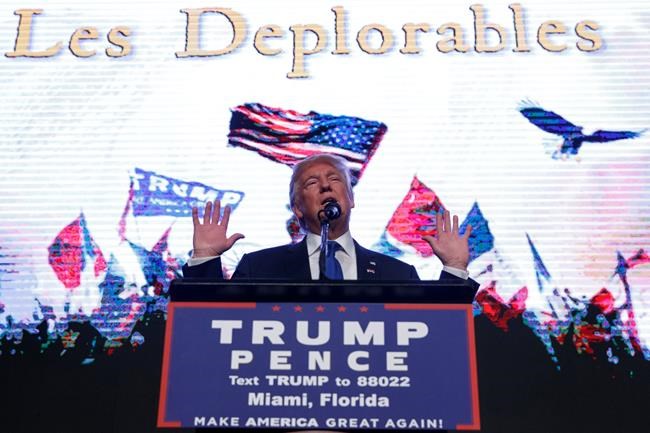 The Latest: Clinton campaign protests Trump comment on guns | iNFOnews.ca CP203332597