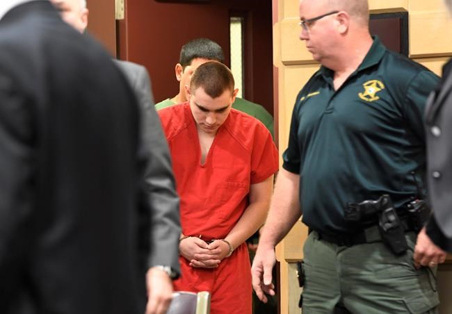 The Latest: Florida sheriff wants school police department | iNFOnews.ca