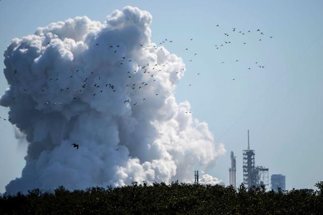 SpaceX fires engines on big new rocket in launch pad test | iNFOnews.ca