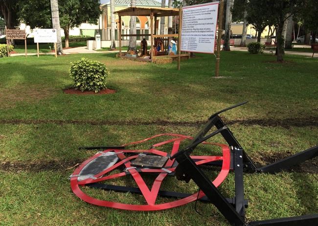 Vandals attack pentagram erected to protest Nativity scene | iNFOnews.ca CP98973937