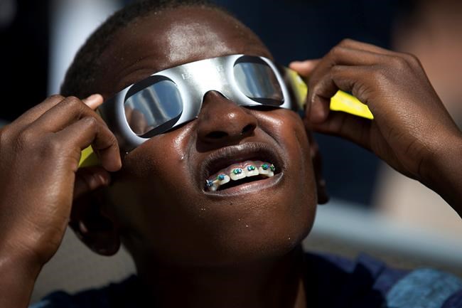The Latest: Car strikes 2 women watching eclipse, 1 dies | iNFOnews.ca