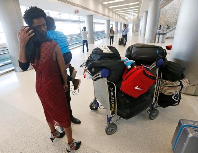 Ethiopian runner who protested in Rio reunites with family | iNFOnews.ca