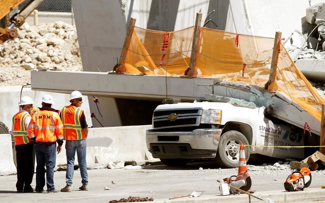 The Latest: Caller reported cracks in bridge before collapse | iNFOnews.ca