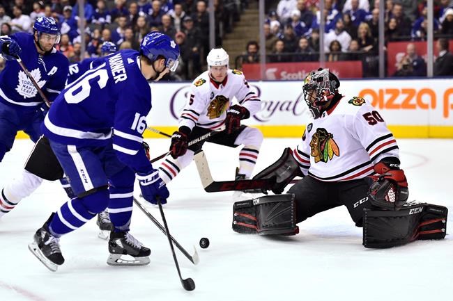 Perlini, Blackhawks hold off late charge by Maple Leafs for wild 5-4 win | iNFOnews.ca Perlini, Blackhawks hold off late charge by Maple Leafs for wild 5-4 win | iNFOnews.ca