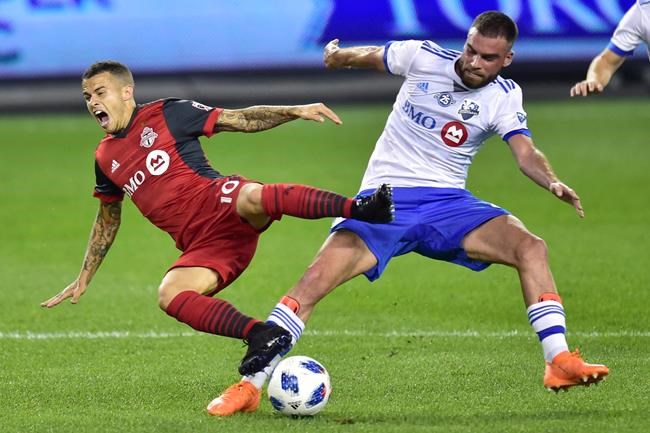 Giovinco on target as Toronto FC beats Montreal 3-1 to keep playoff hopes alive | iNFOnews.ca CP1587922655