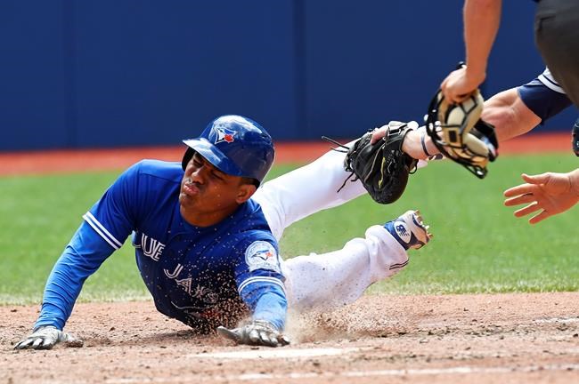 Toronto outscores Cleveland 9-6 to end Indians' 14-game winning streak | iNFOnews.ca CP1726110066