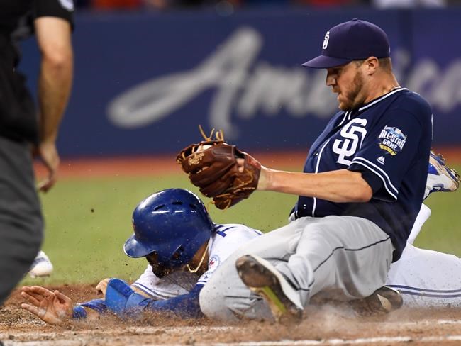Travis scores walk-off winner on wild pitch as Blue Jays top Padres in extras | iNFOnews.ca