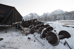 Track reopens in Lake Louise after rail car hangs off bridge over river | iNFOnews.ca CP30914786