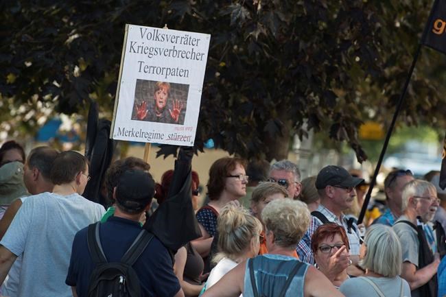 Protester who harassed German reporters works for police | iNFOnews.ca Protester who harassed German reporters works for police | iNFOnews.ca