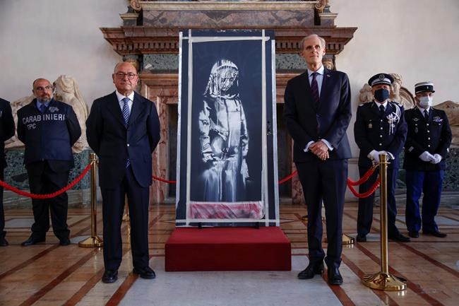 Italy returns stolen Banksy to France on Bastille Day | iNFOnews.ca Italy returns stolen Banksy to France on Bastille Day | iNFOnews.ca