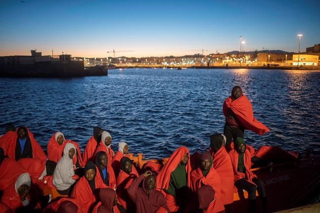 The Latest: Half of migrants at centre of standoff off Malta | iNFOnews.ca
