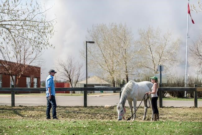 Evacuation lifted for some in Fort McMurray; kept in place for trailer park | iNFOnews.ca Evacuation lifted for some in Fort McMurray; kept in place for trailer park | iNFOnews.ca