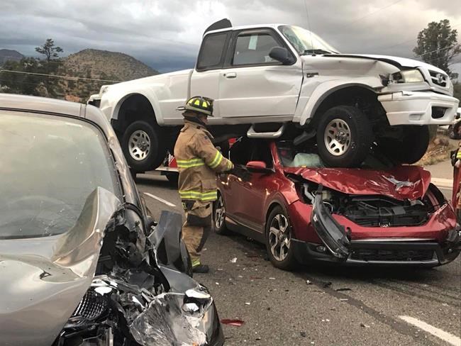 Pickup truck lands on top of car in Arizona, no one hurt | iNFOnews.ca