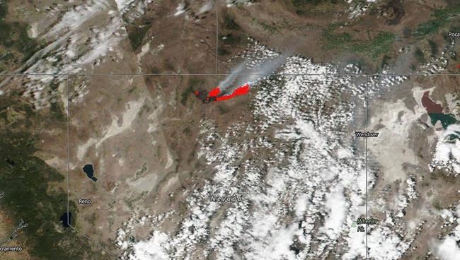 Crews gaining on huge Nevada wildfire visible from space | iNFOnews.ca