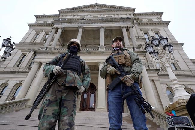 Guns in capitol buildings divide states after armed protests | iNFOnews.ca