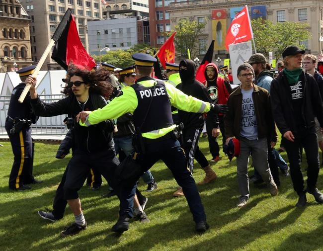 Pro- and anti- immigration protesters face off in duelling rallies | iNFOnews.ca Pro- and anti- immigration protesters face off in duelling rallies | iNFOnews.ca