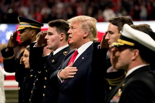 Trump gets a national anthem moment at football title game | iNFOnews.ca Trump gets a national anthem moment at football title game | iNFOnews.ca