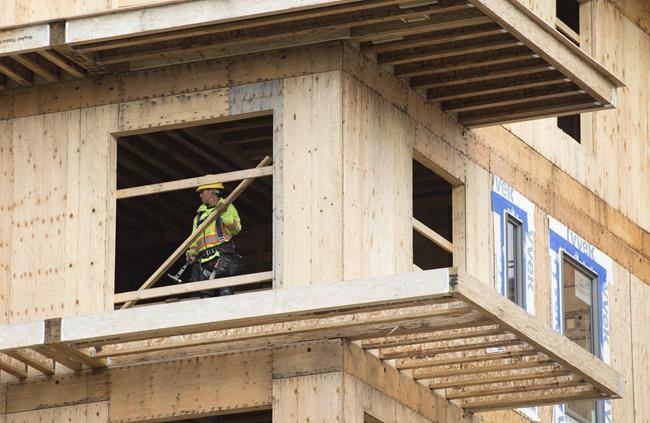 CMHC reports annual pace of housing starts climbed nearly 16 per cent in July | iNFOnews.ca CP790617138