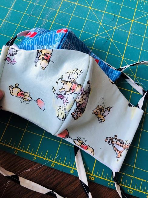 Sewers stitch masks to free up supplies for front-line health-care workers | iNFOnews.ca Sewers stitch masks to free up supplies for front-line health-care workers | iNFOnews.ca