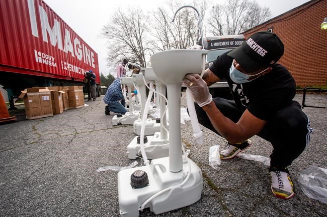 Grammy-winning artist Lecrae distributes wash stations | iNFOnews.ca