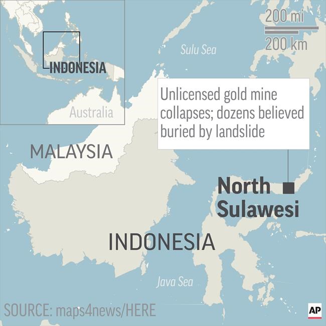 Workers dig by hand to free dozens in Indonesia mine rubble | iNFOnews.ca