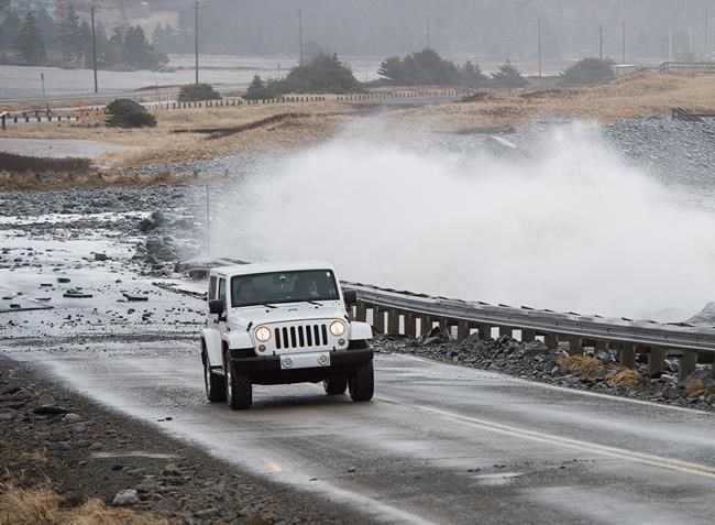East Coast mops up after 'weather bomb' floods roads, batters buildings | iNFOnews.ca